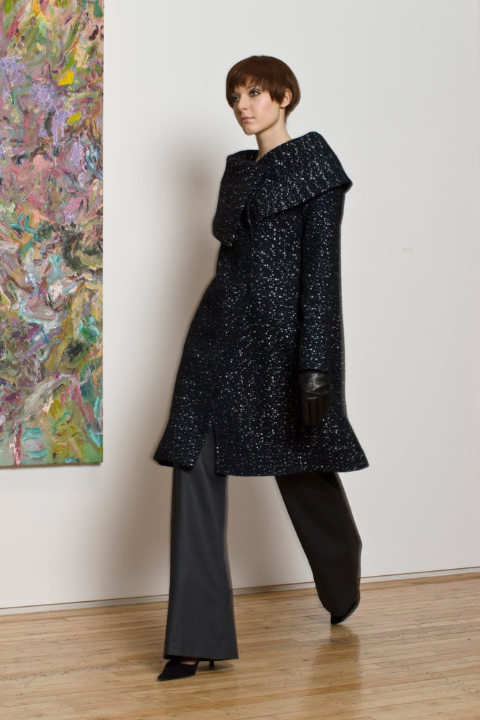 black wool coat and leather pants