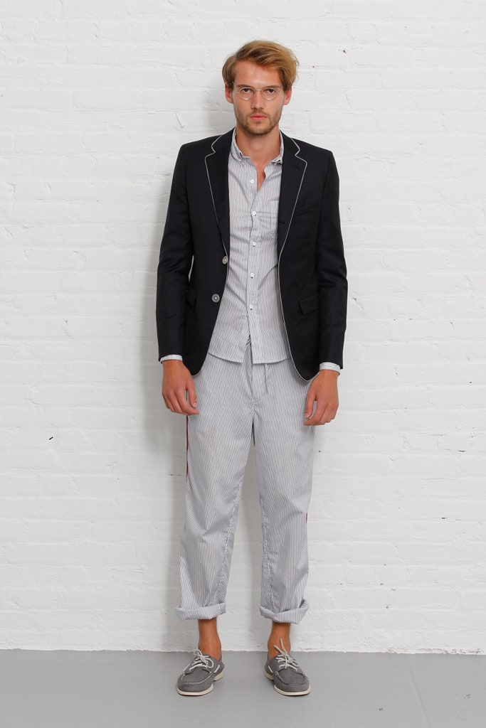 black tailored blazer with striped shirt