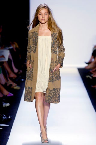 beige embroidered coat and white dress
