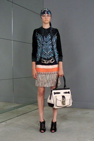 fitted black embroidered top with mini skirt