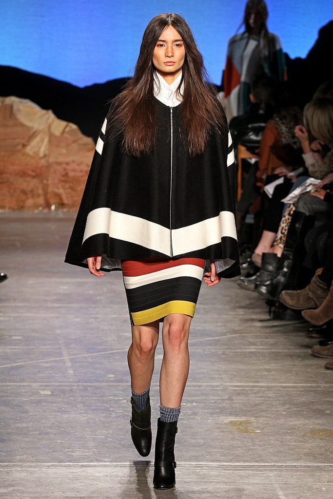 black and white layered cape with fitted skirt