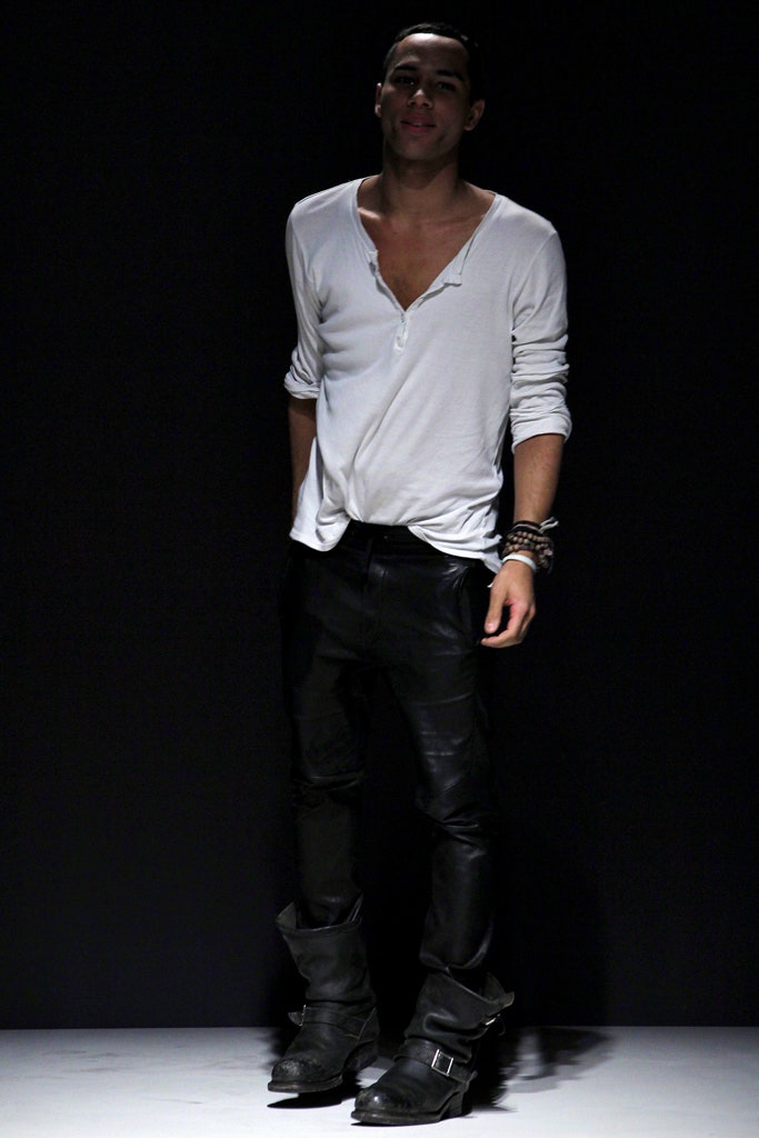 white relaxed shirt with black leather pants