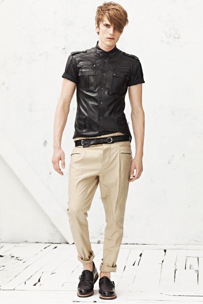 black leather fitted shirt with beige pants