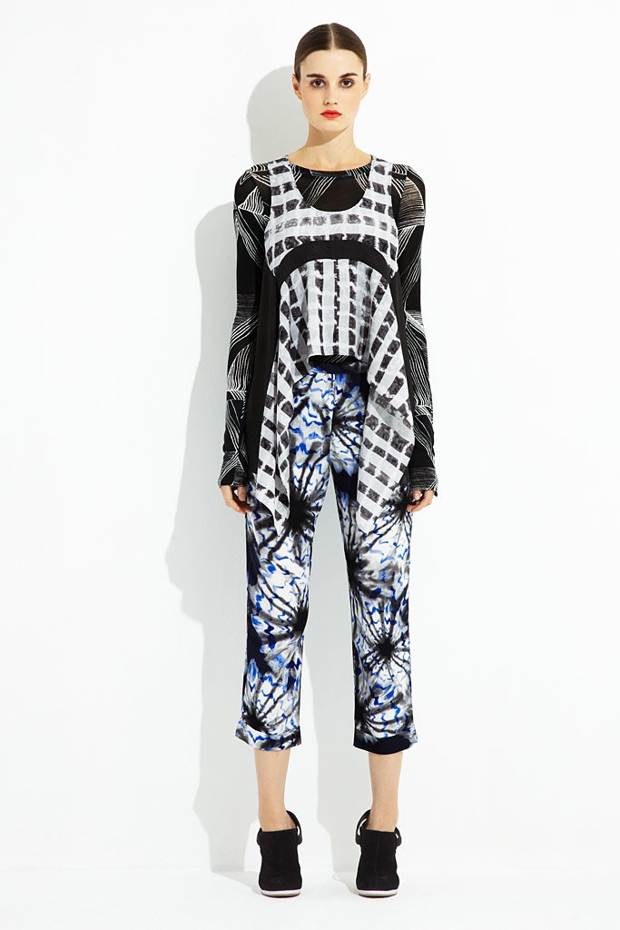 black and white printed top with blue pants
