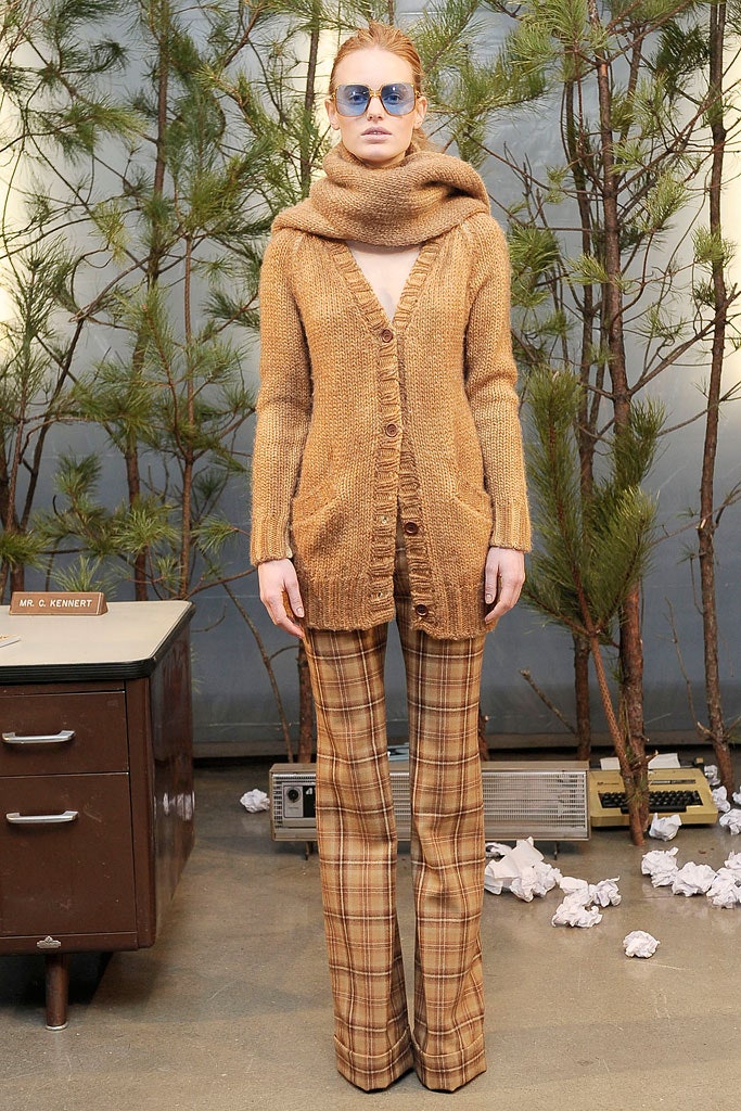 brown wool cardigan and beige flared pants