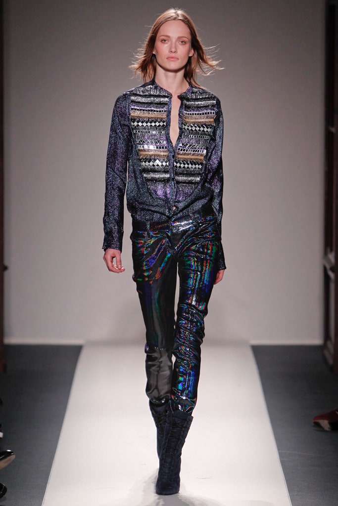 fitted blue silk shirt and black vinyl pants