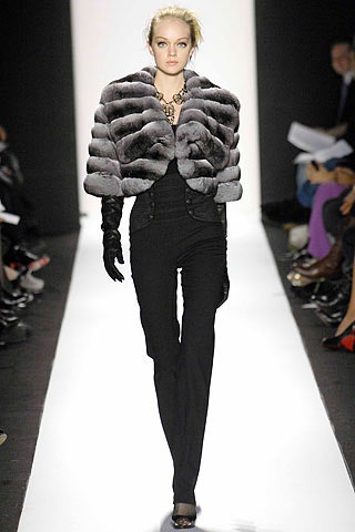 gray faux-fur coat and black pants