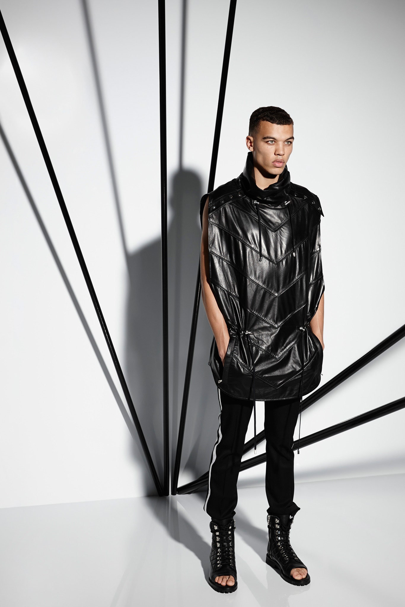 black leather sleeveless top and pants