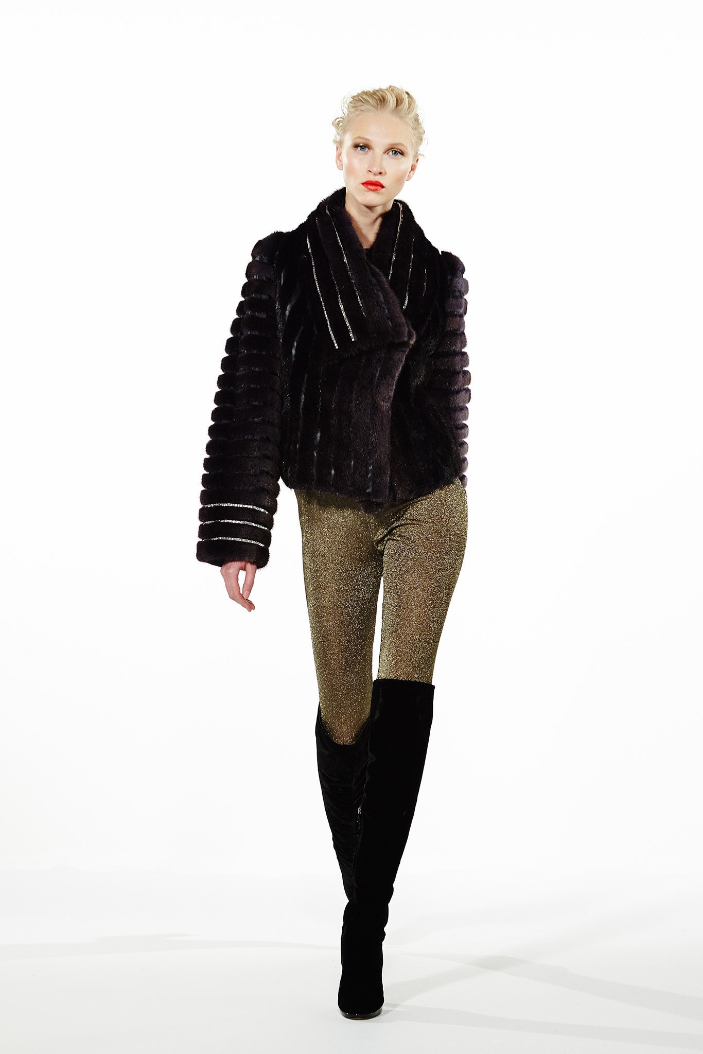 black fur jacket and gold pants