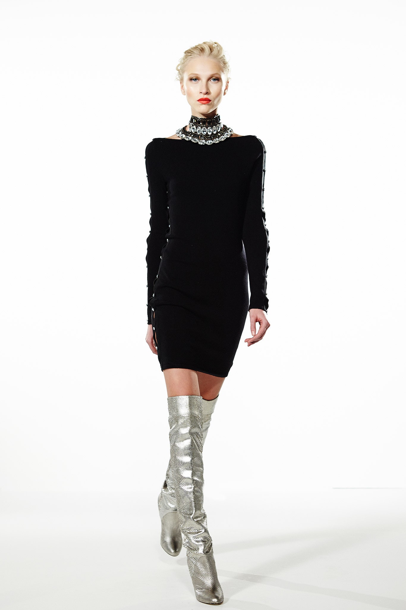 black fitted mini dress with silver boots