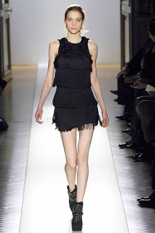 black fringed mini dress with boots