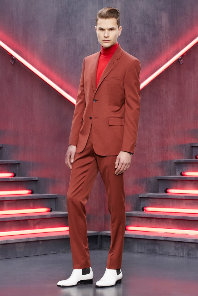 red tailored suit with turtleneck