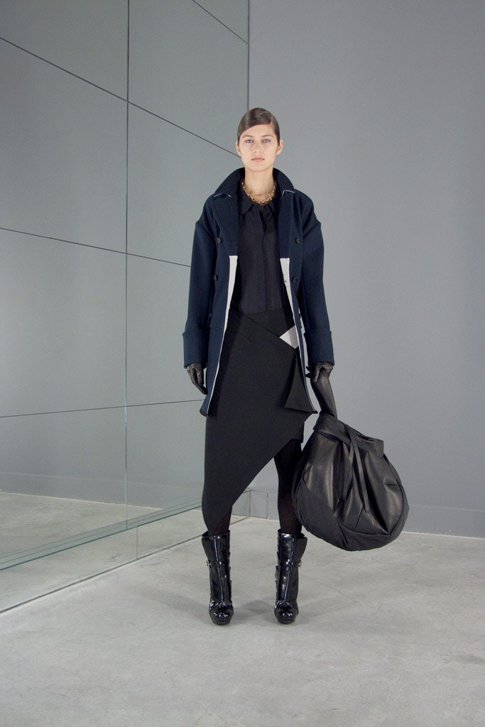 black wool coat with asymmetric skirt