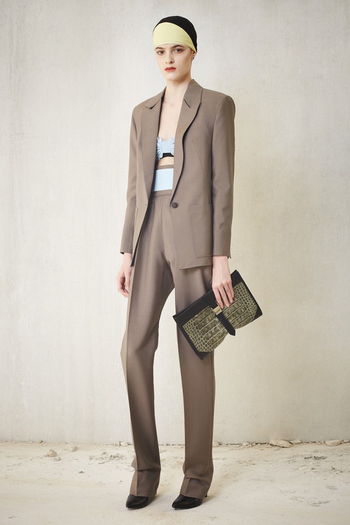 beige tailored suit with blue top