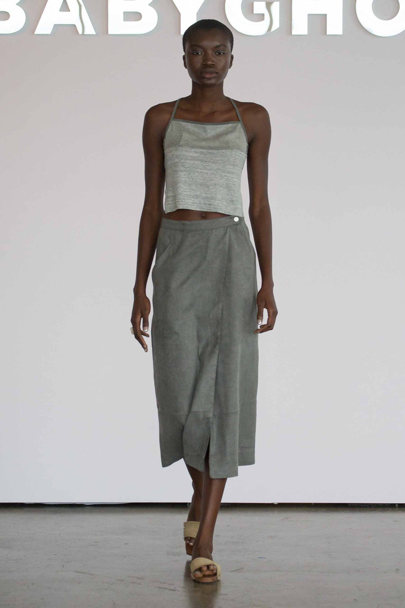 gray silk top and suede skirt