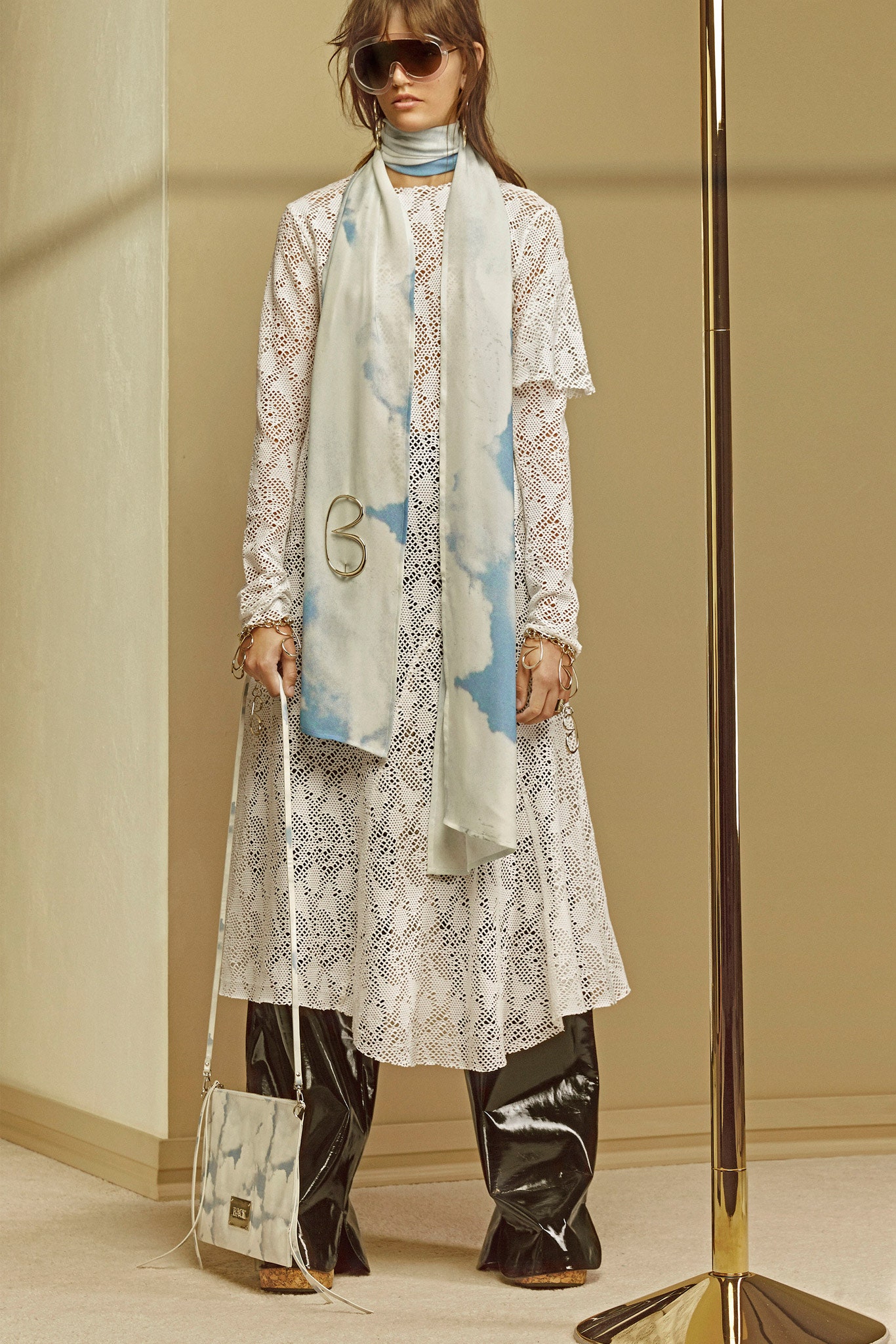 white lace midi dress with black vinyl pants