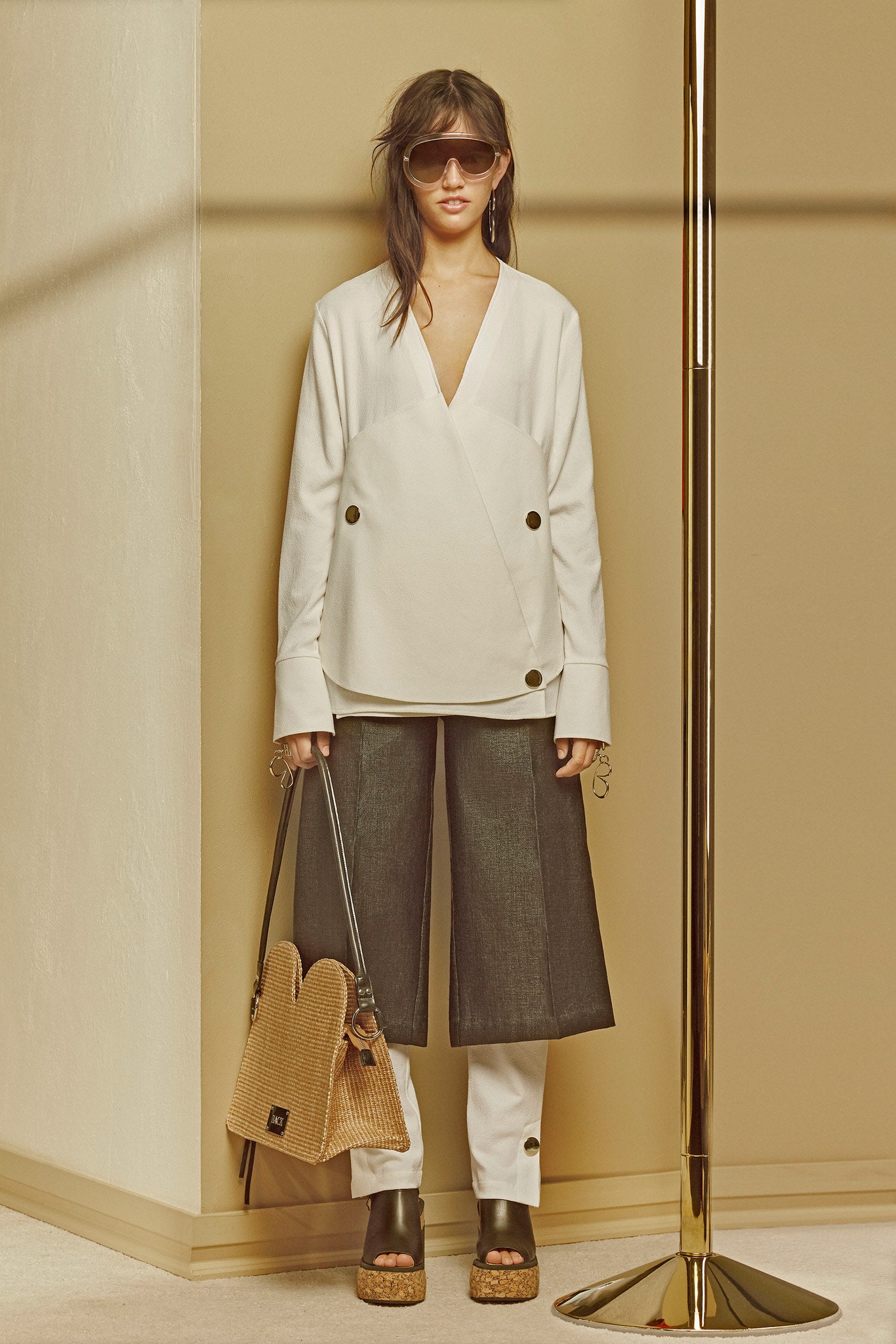 white relaxed top with gray wide-leg pants