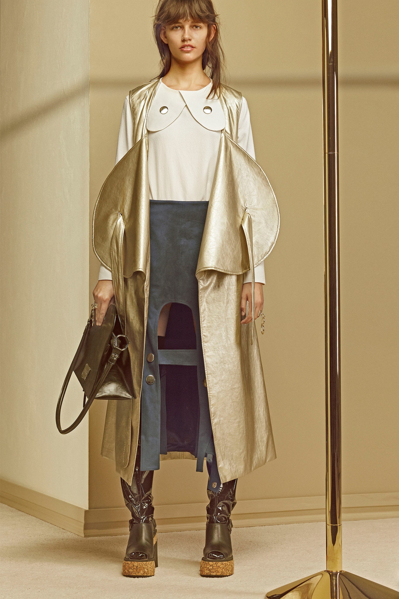 gold metallic sleeveless coat