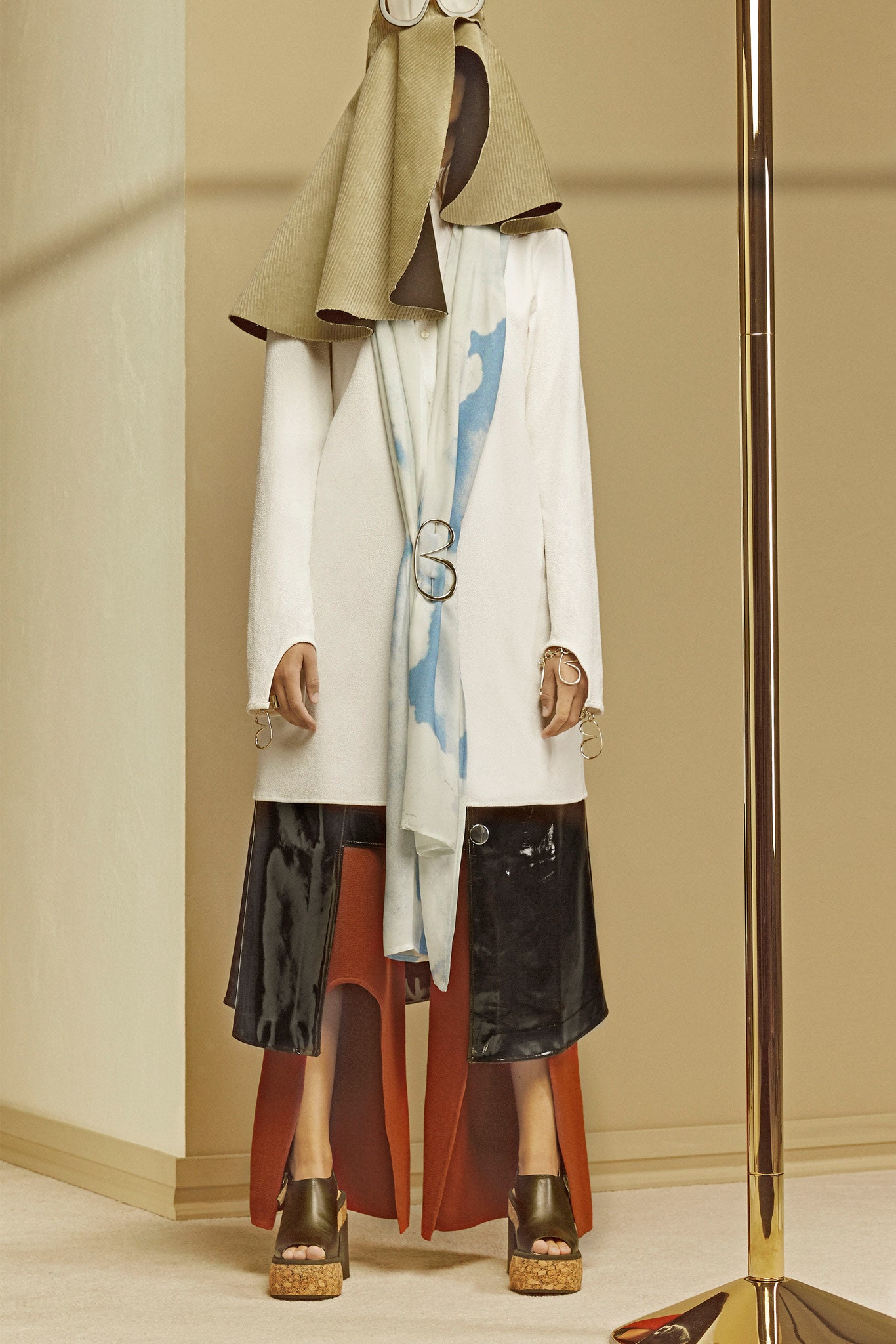 white relaxed top with black skirt