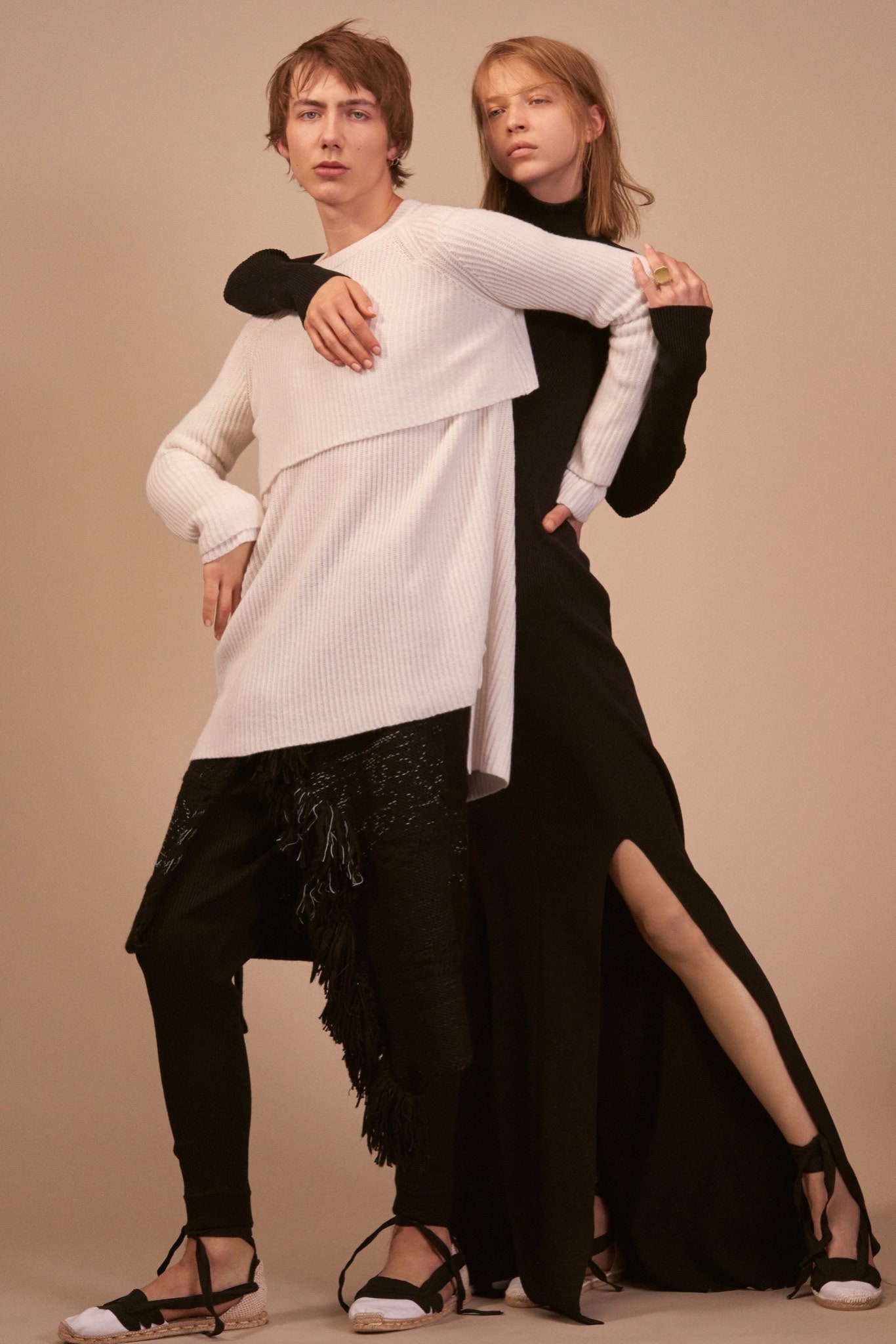 white relaxed top and black fitted dress