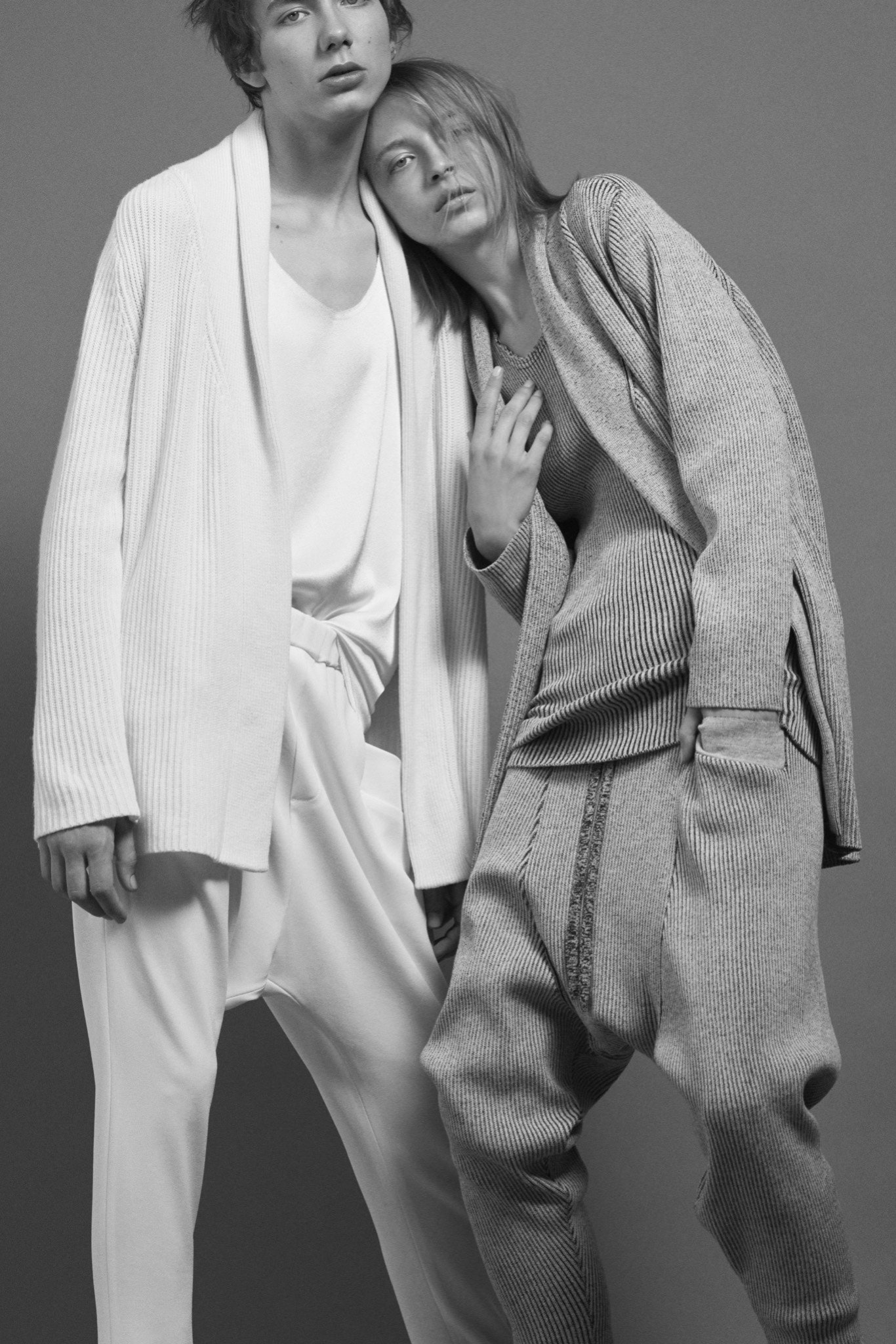 white cardigan and gray pants