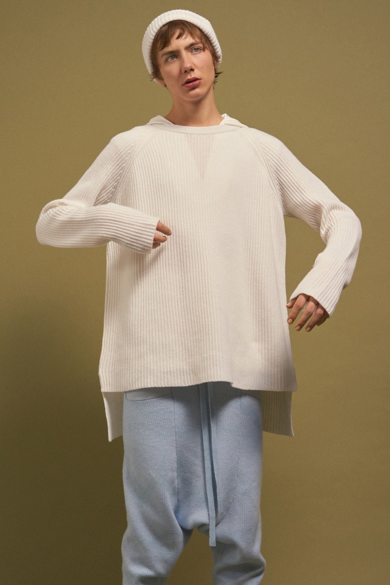 white relaxed top with blue pants