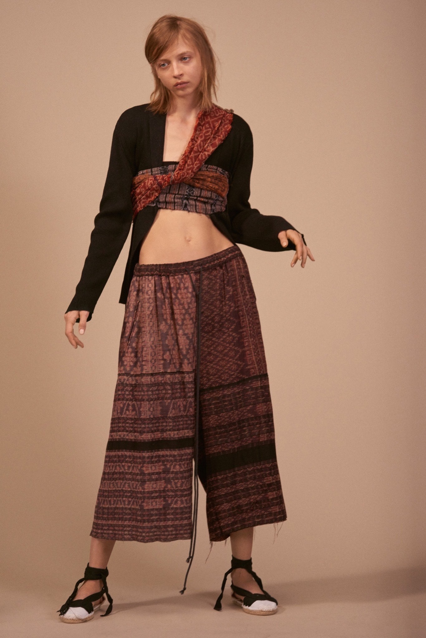 black and red layered top with relaxed pants