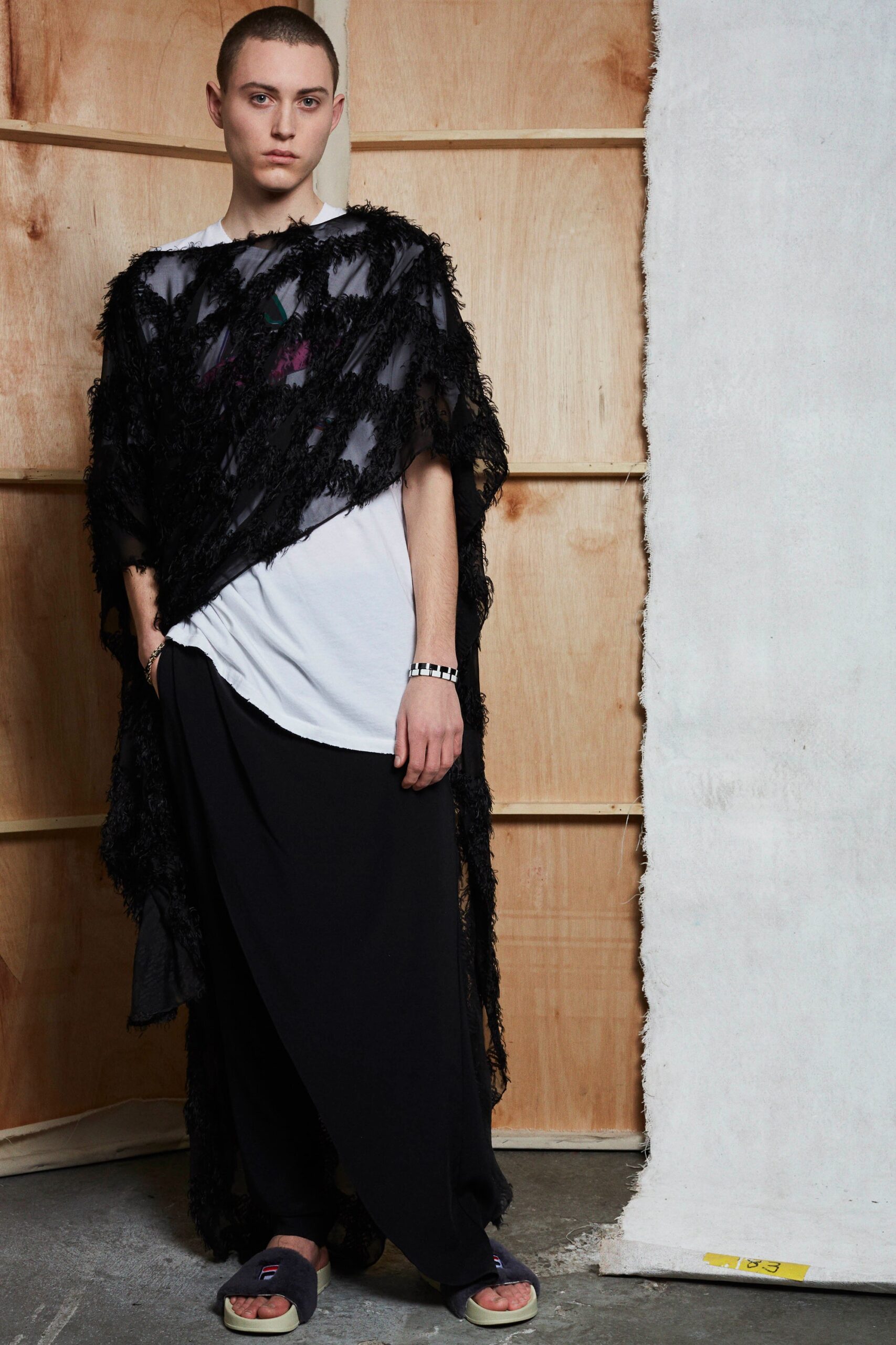 black lace cape with white top