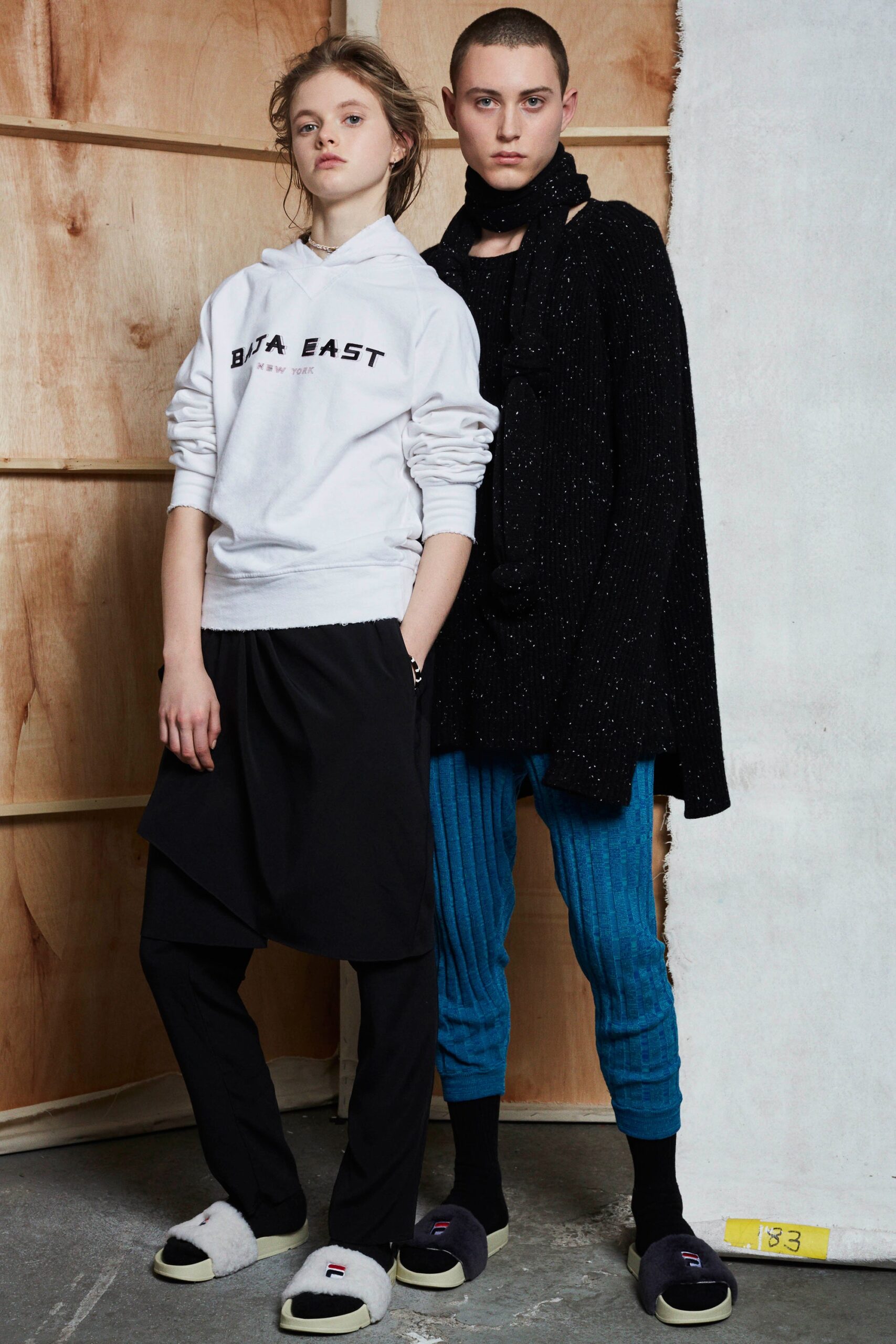 white hoodie with black skirt