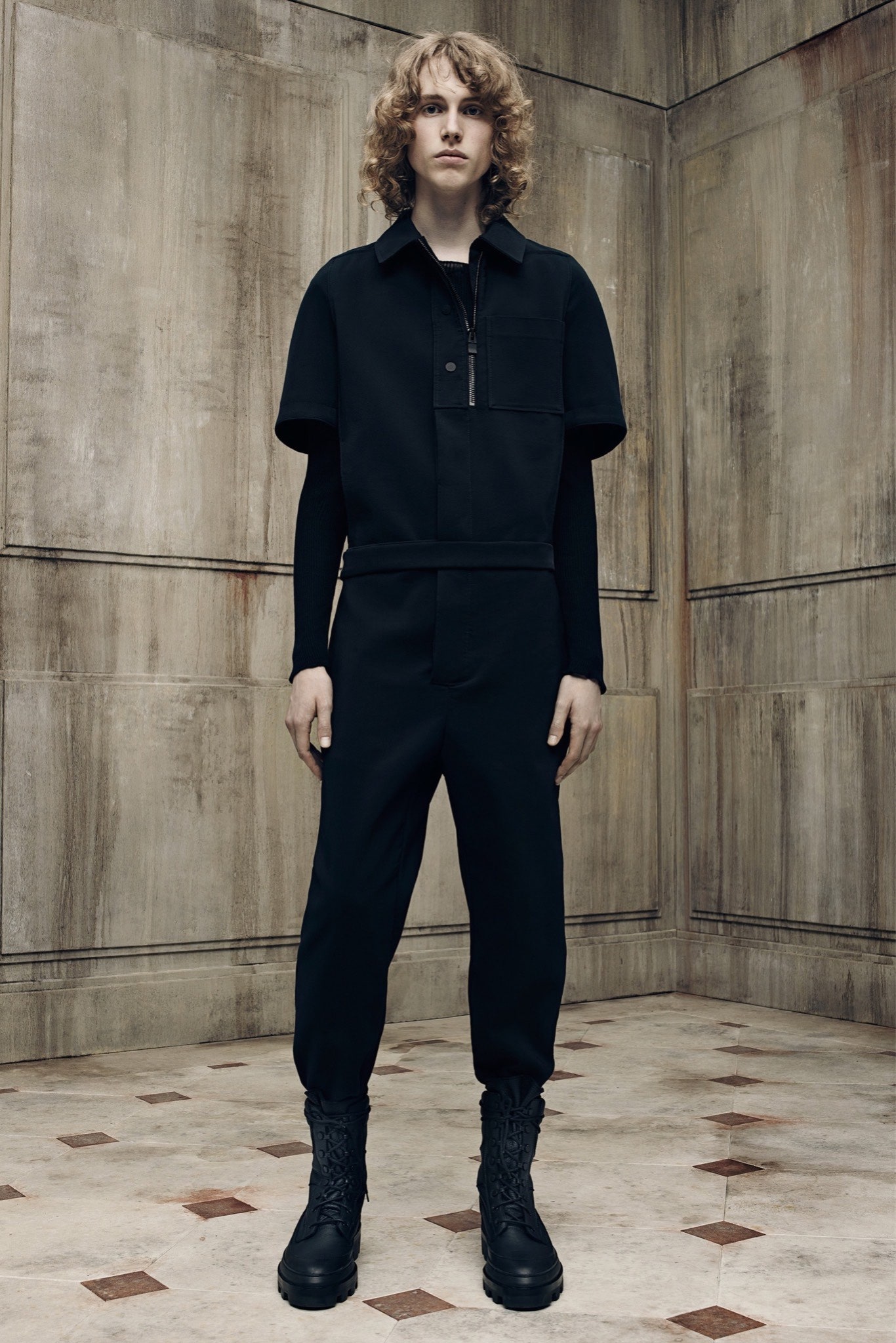 black fitted jumpsuit with boots