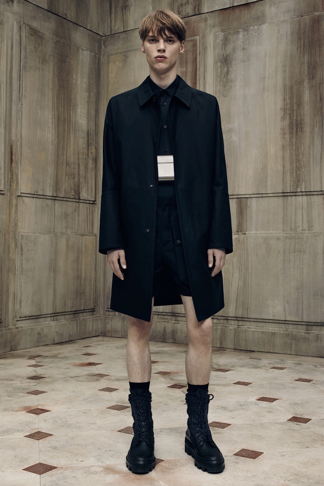 black relaxed coat with fitted shirt