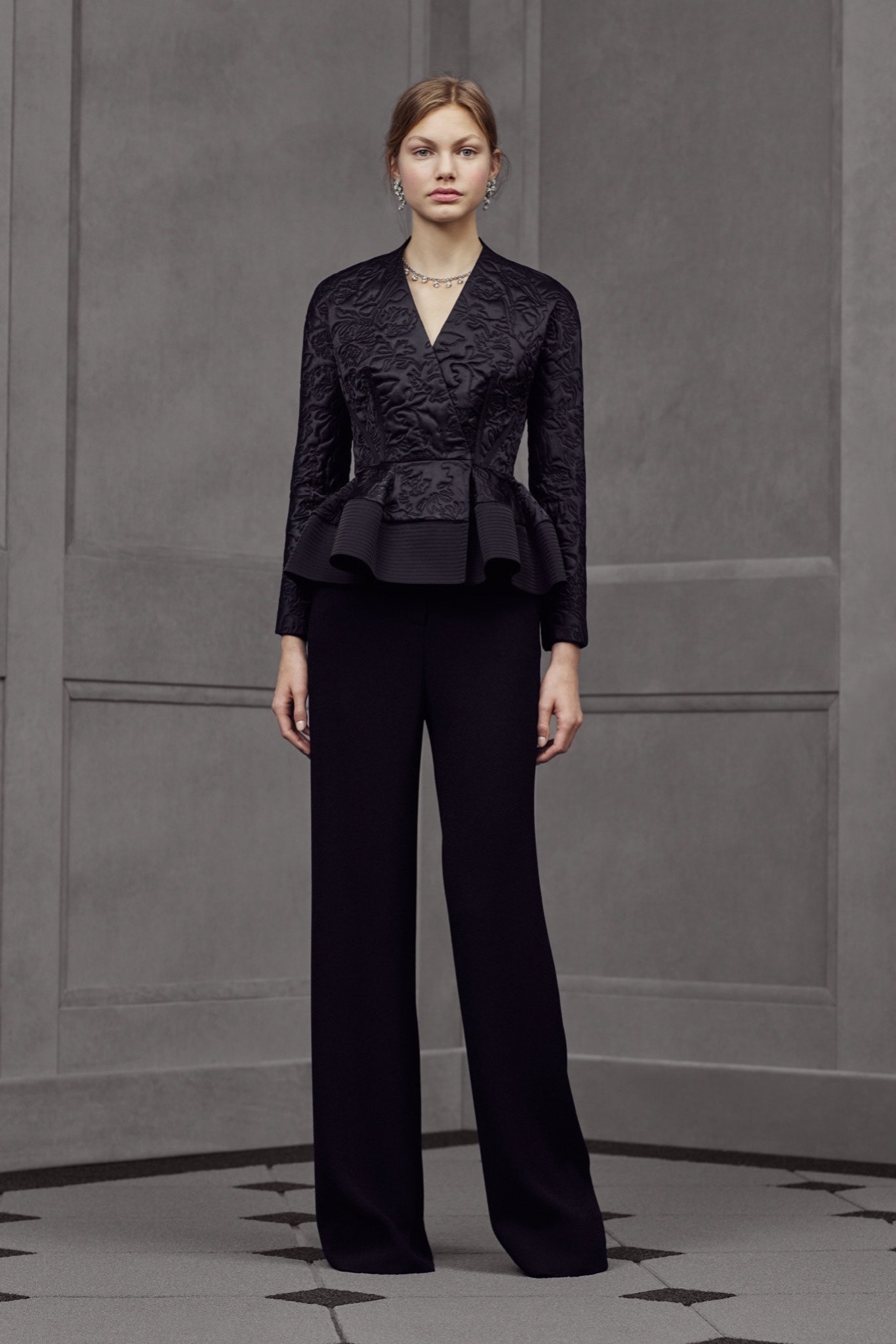 black silk fitted blazer and relaxed pants