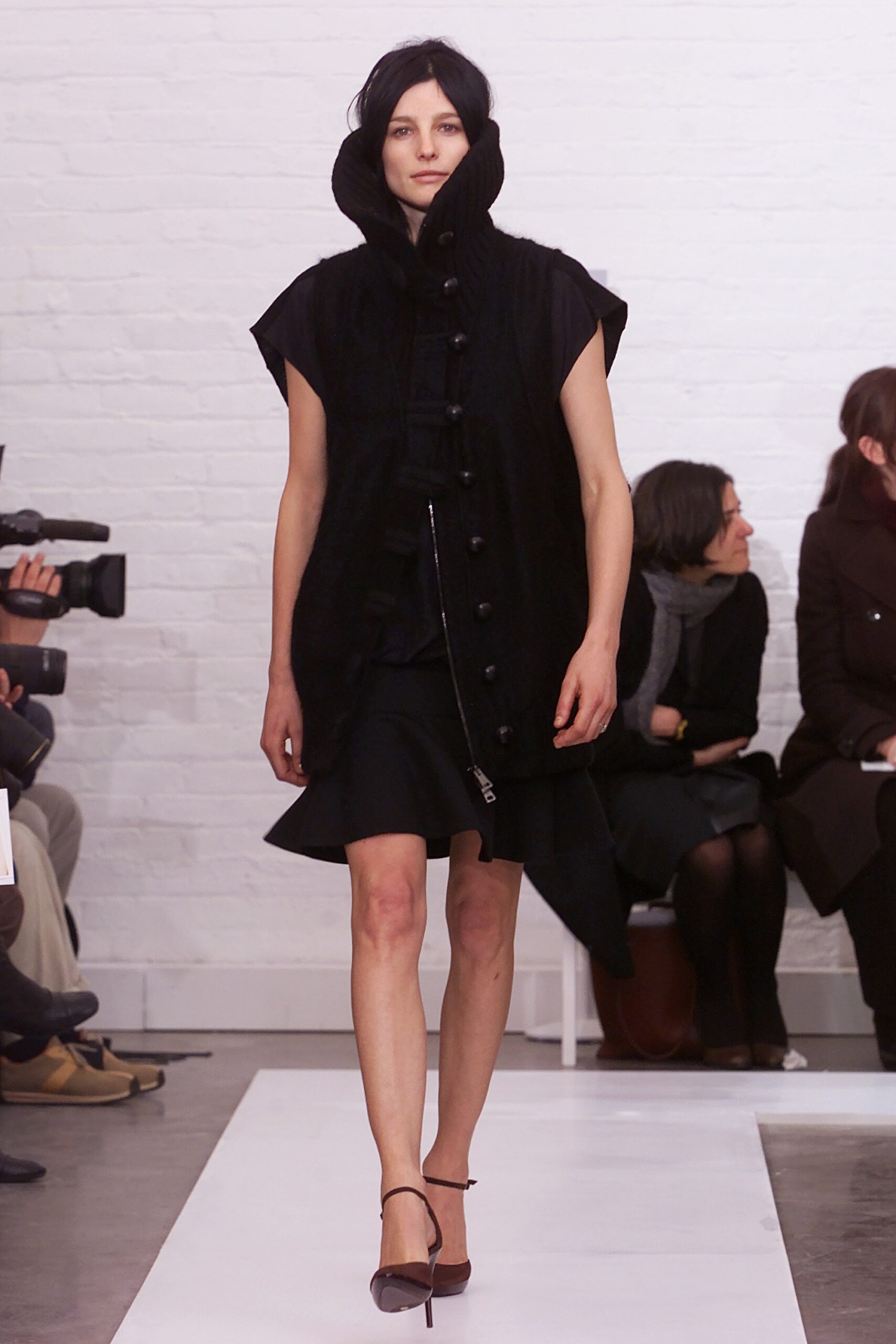 black wool long-sleeve collared oversized buttoned coat