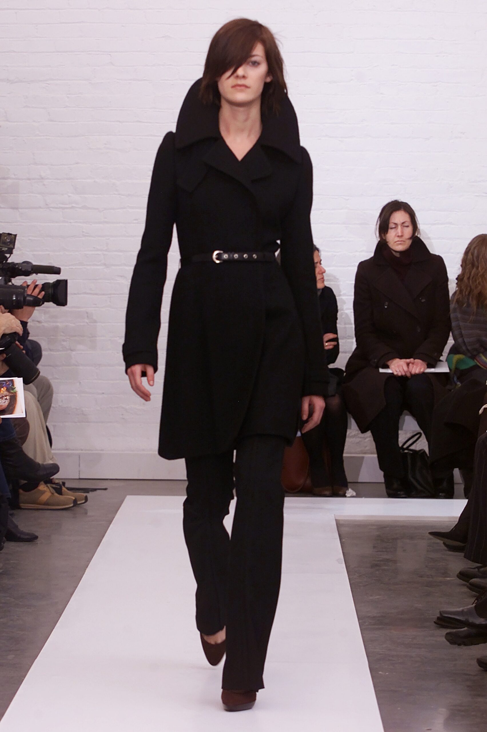 black wool long-sleeve collared fitted belted coat