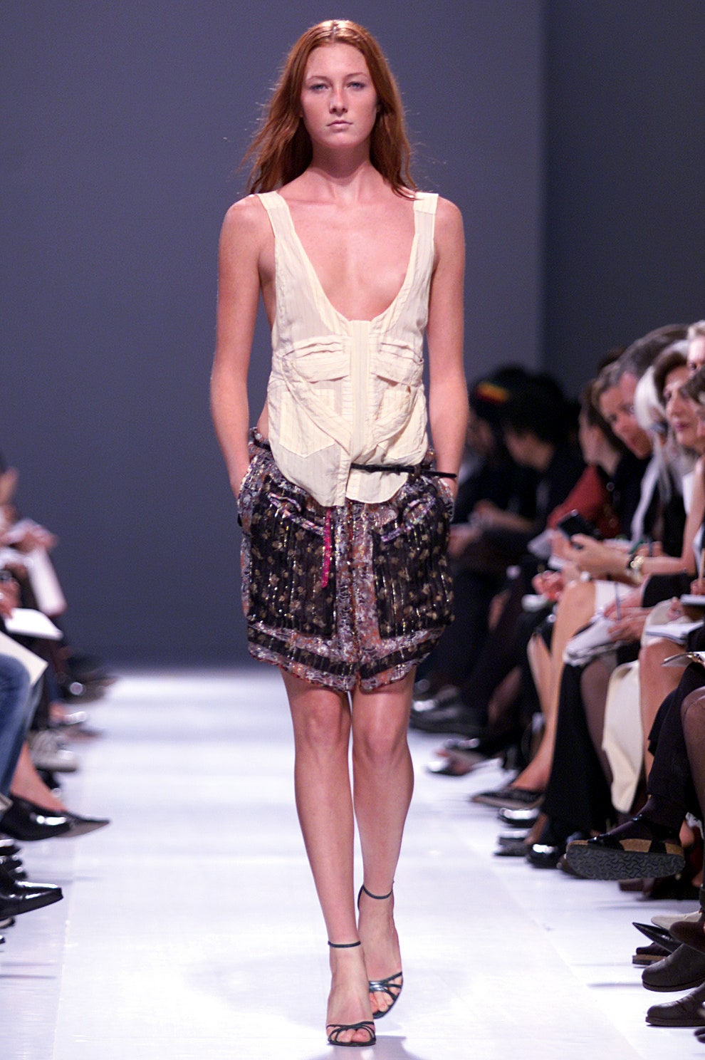 beige fitted top with multi skirt