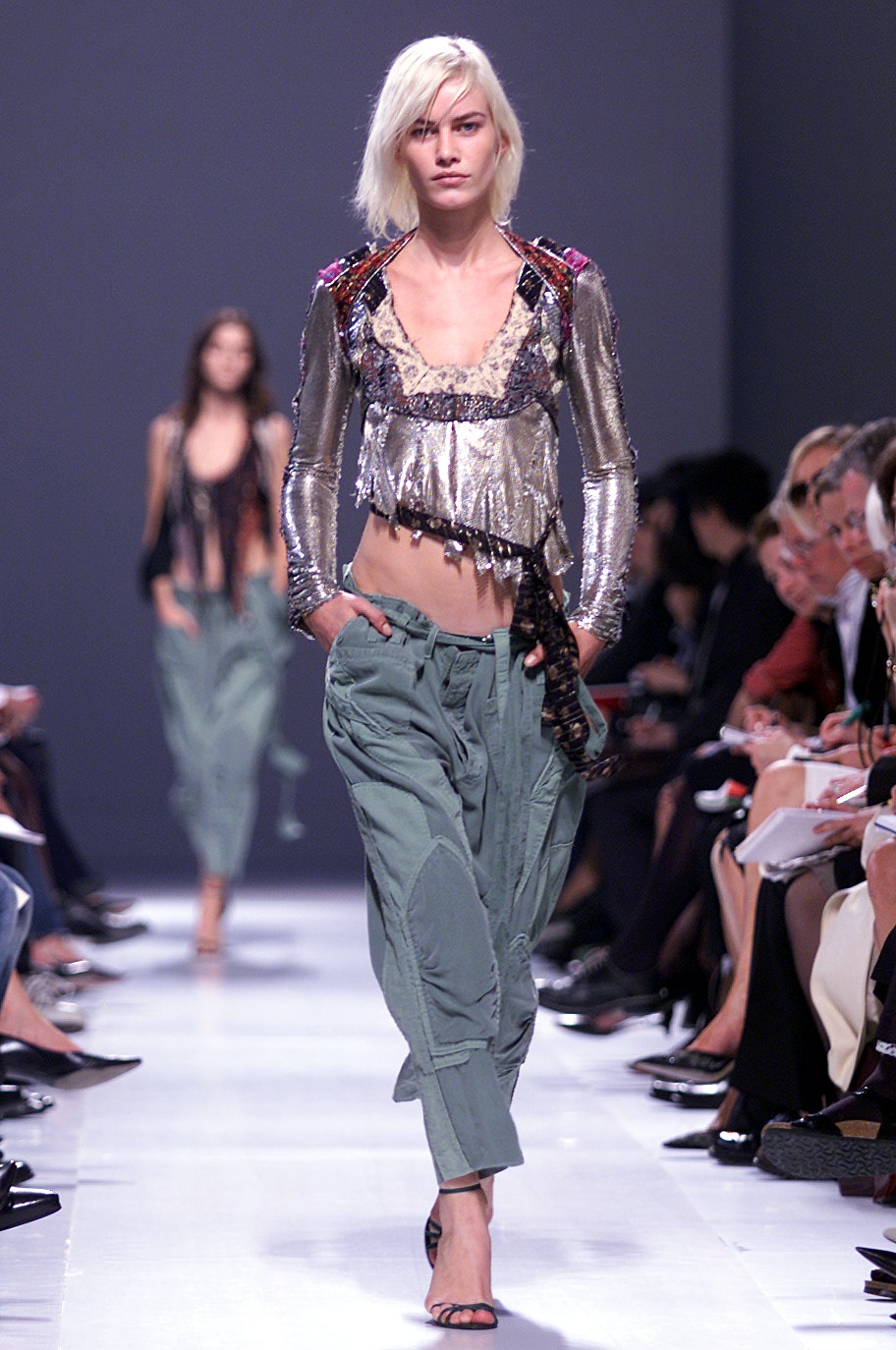 silver fringed top and green cargo pants