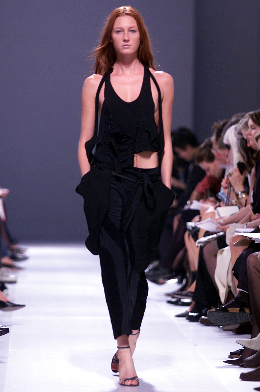 black fitted halter top with relaxed pants