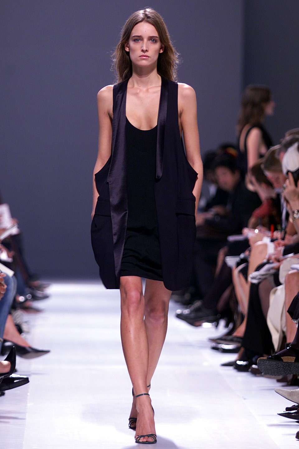 black mini dress with relaxed vest