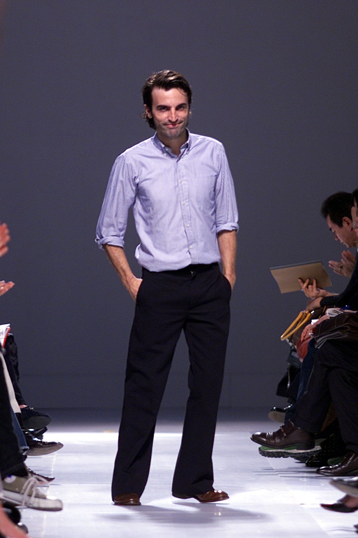 blue fitted shirt and black tailored pants