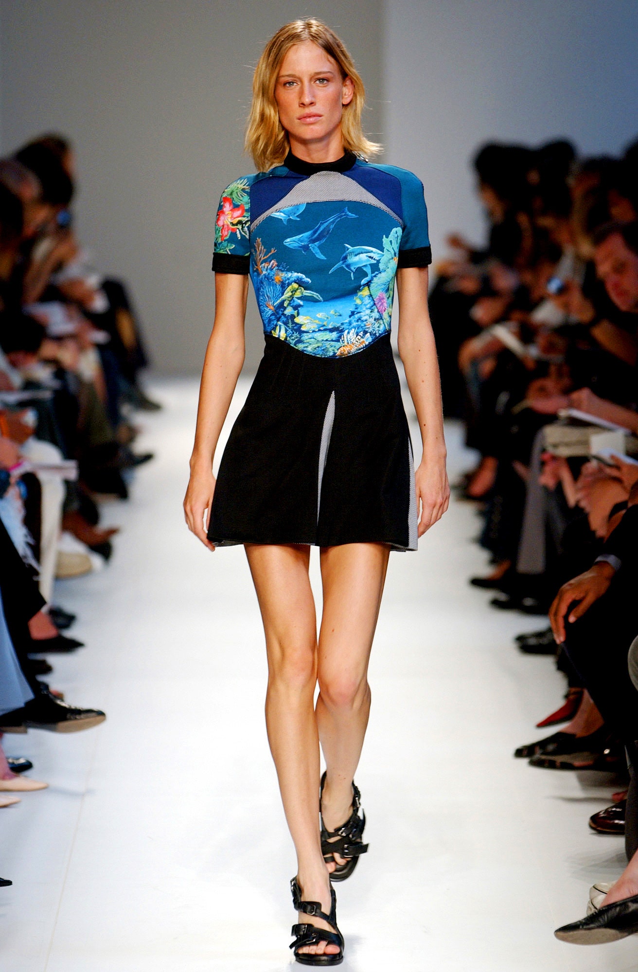 blue printed top with black mini skirt