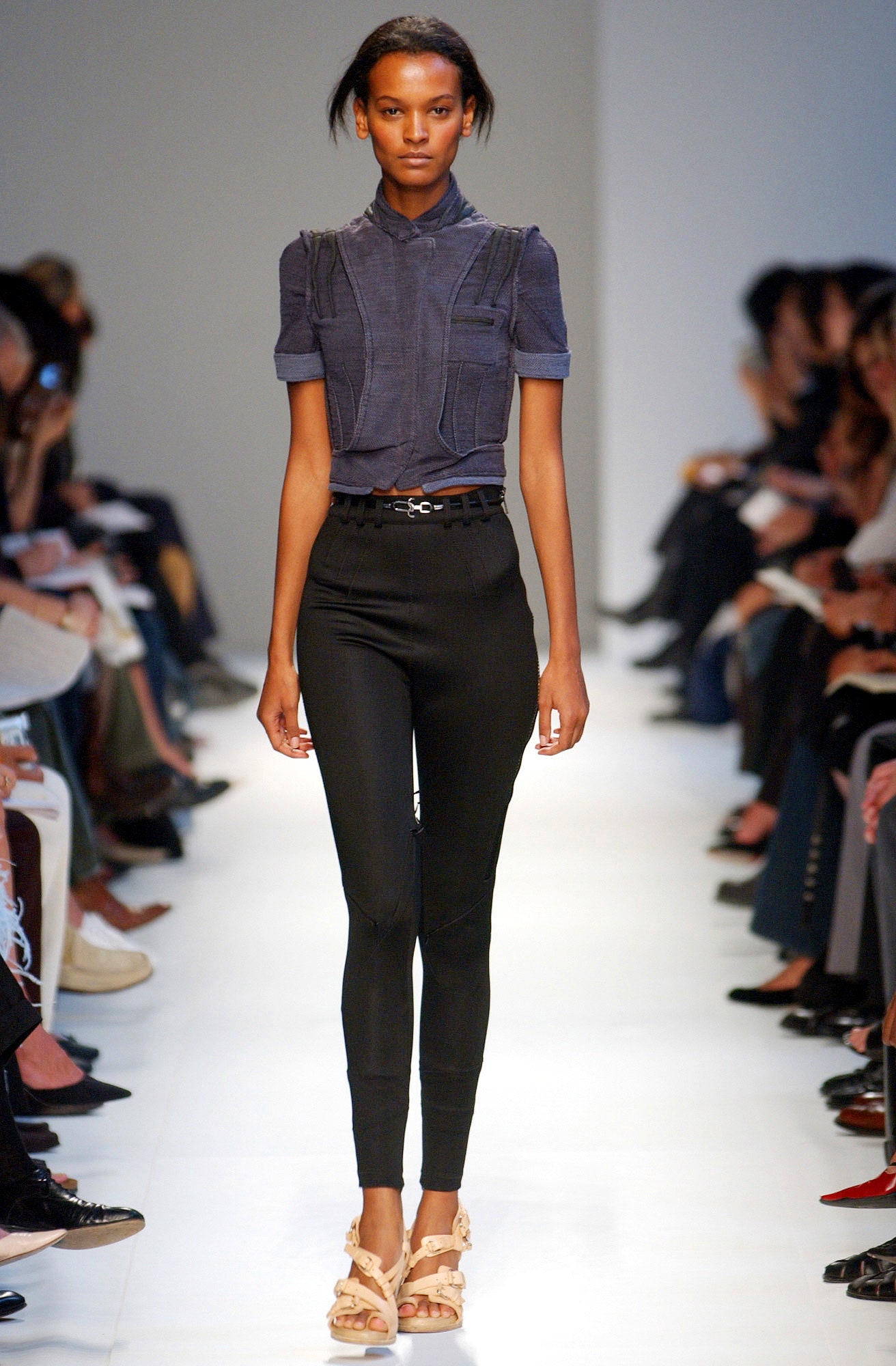 blue denim fitted top with black pants
