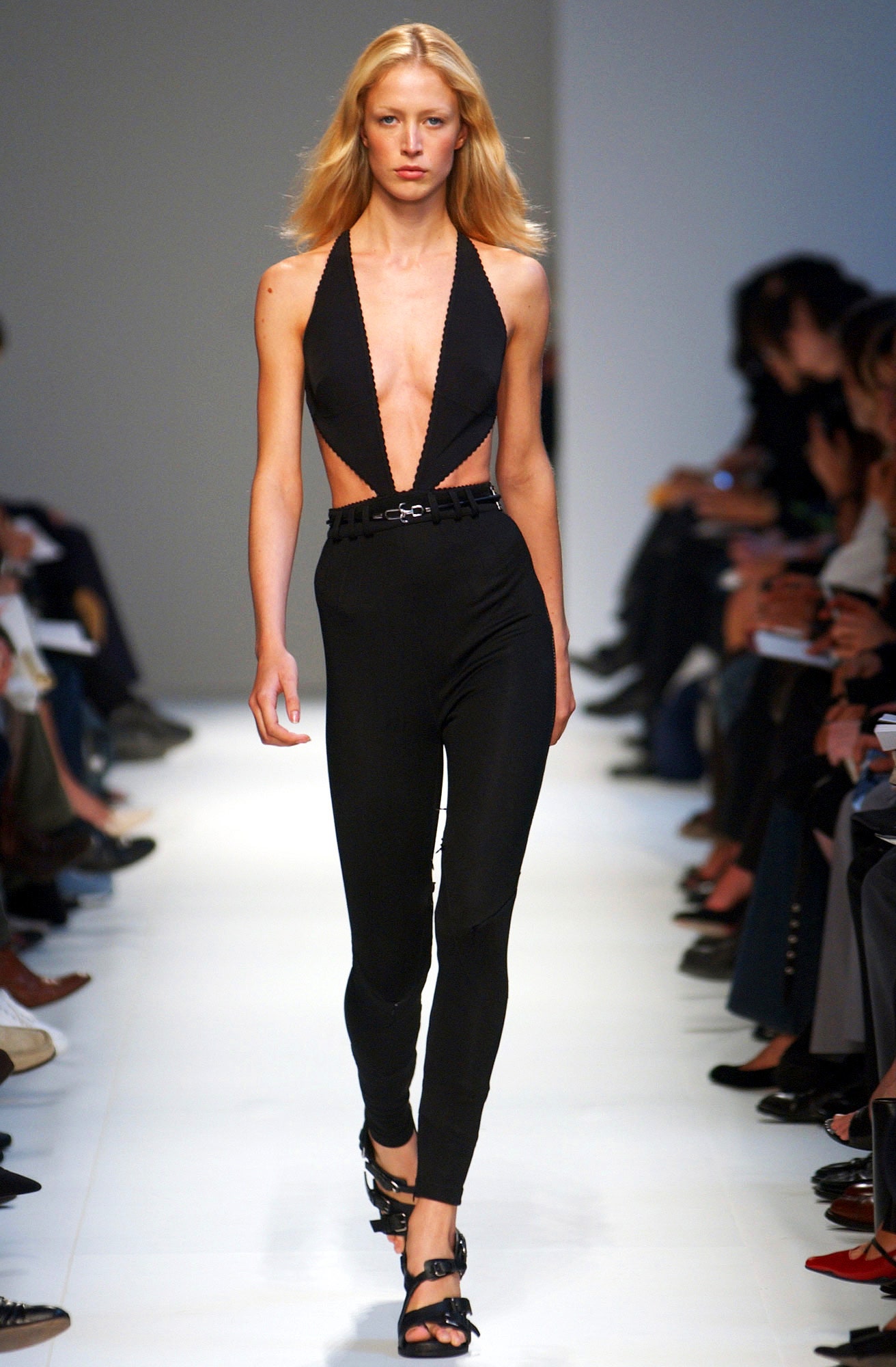 black fitted sleeveless catsuit