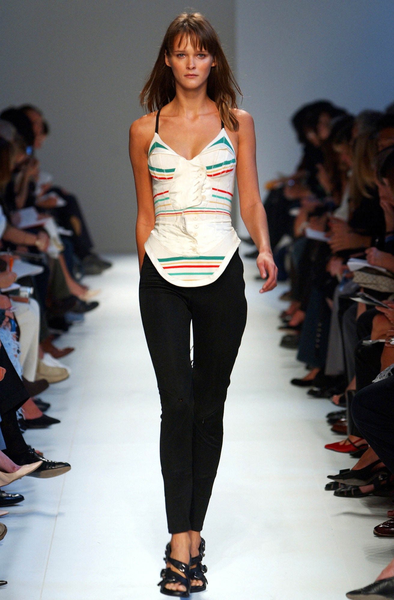 striped bodysuit and black pants