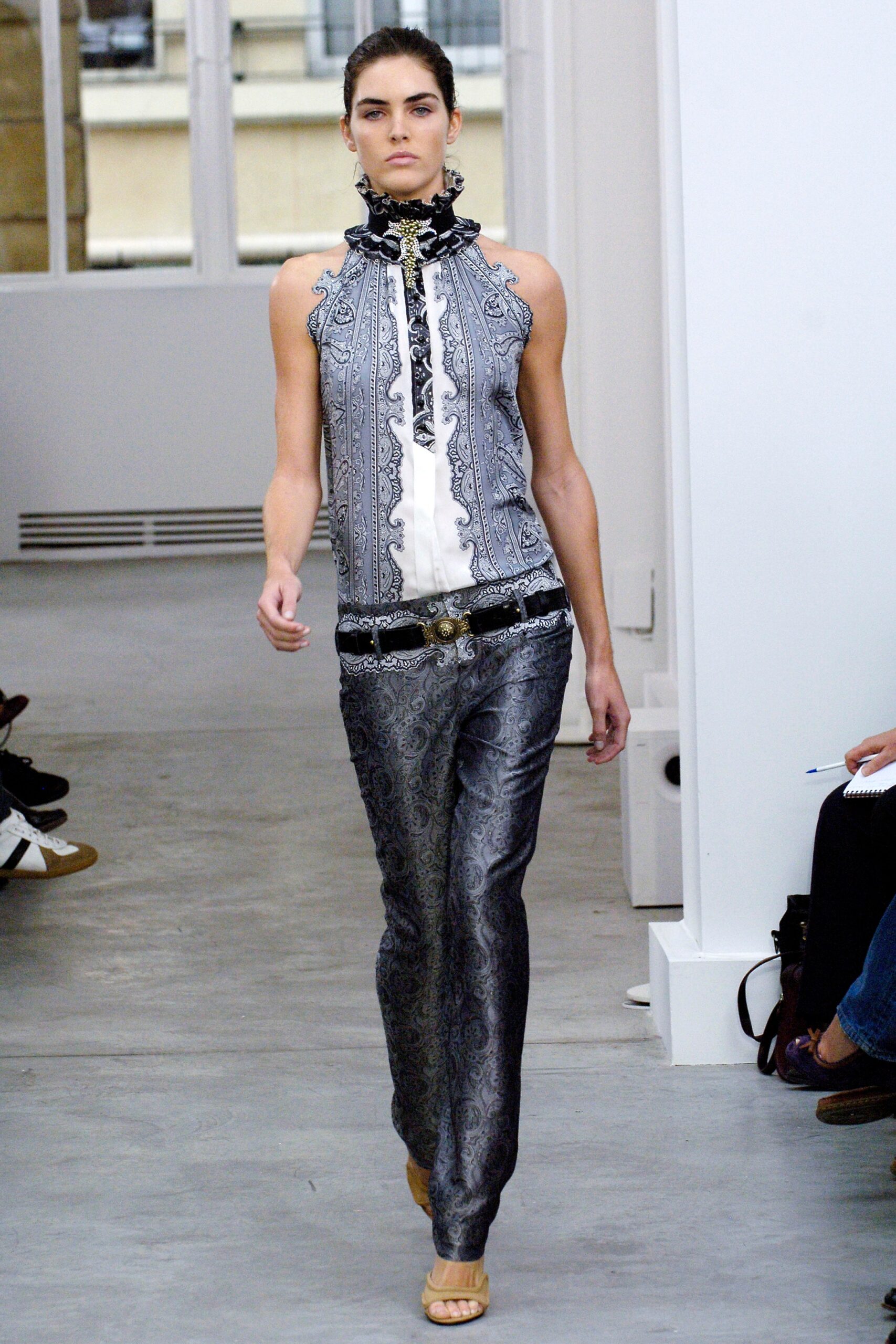 black and white silk top with flared pants