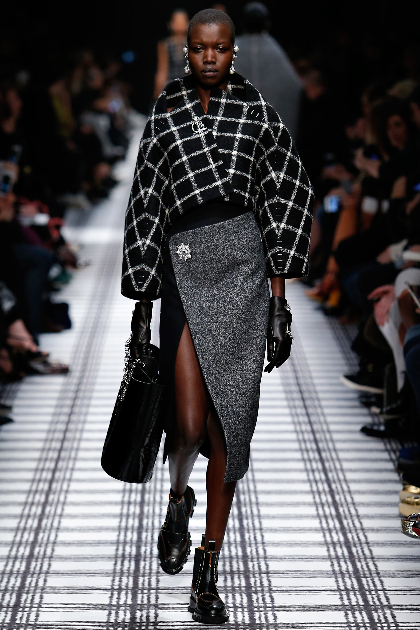 black and white checked coat with gray skirt