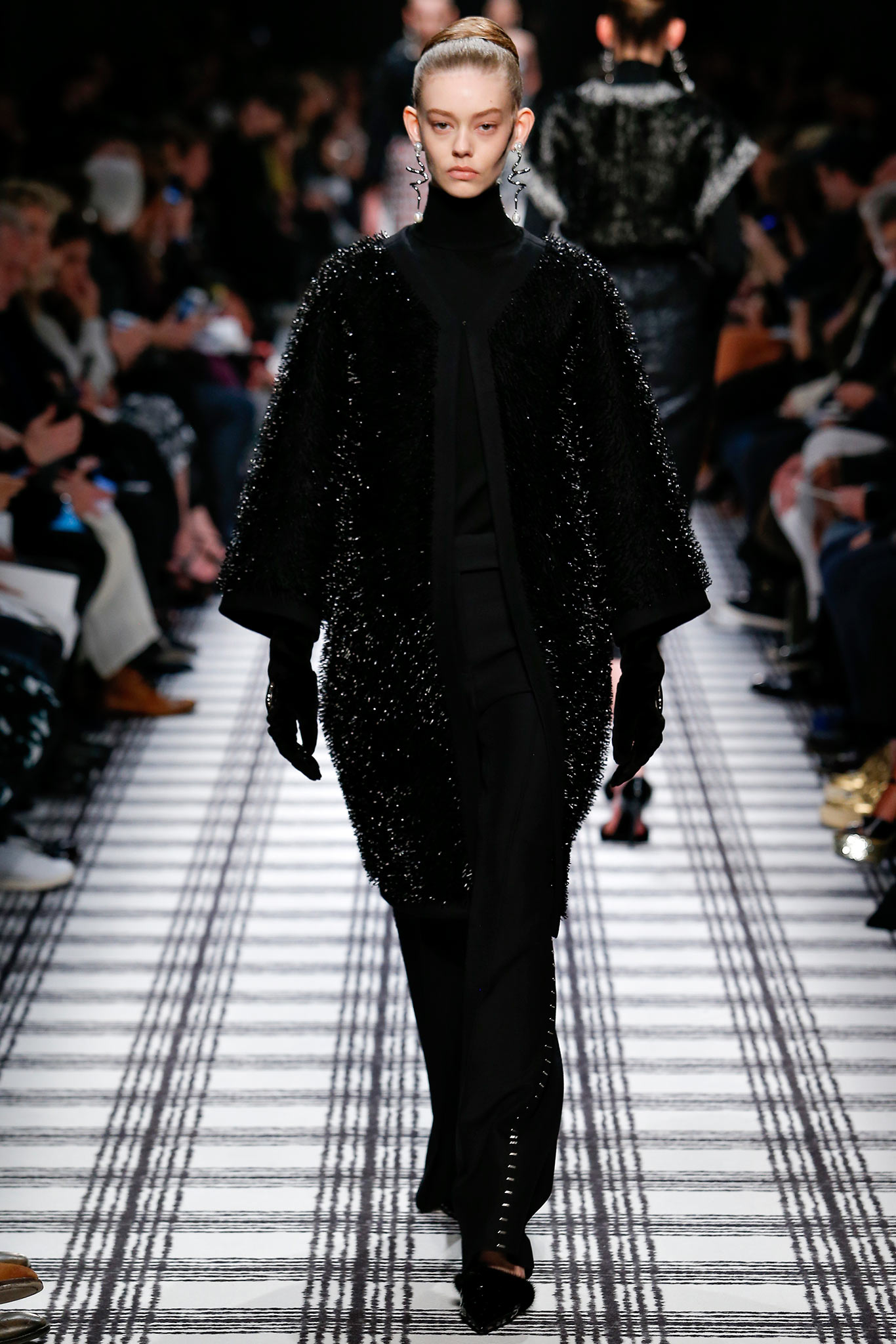 black wool relaxed coat and fitted pants