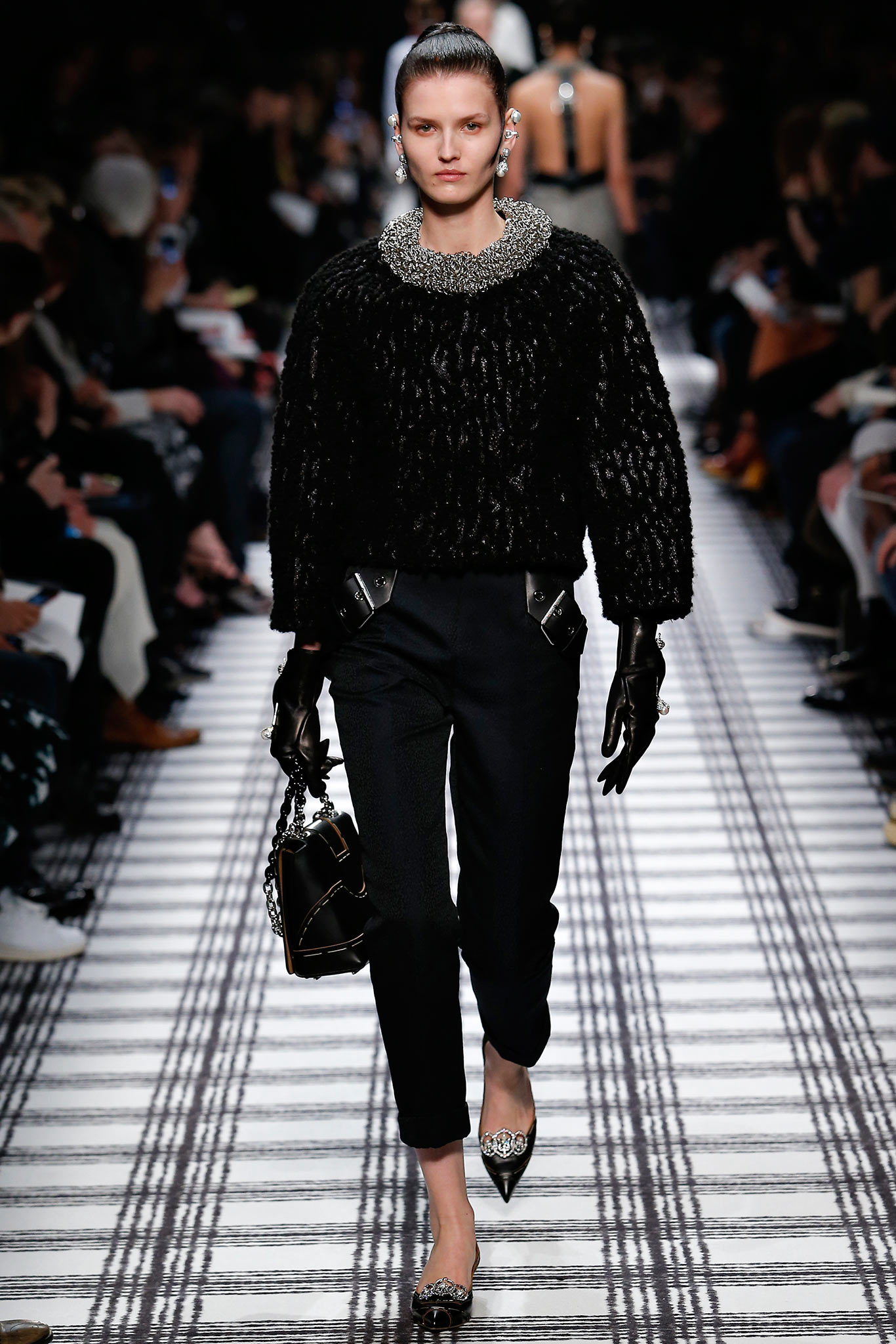 black fur top with tailored pants