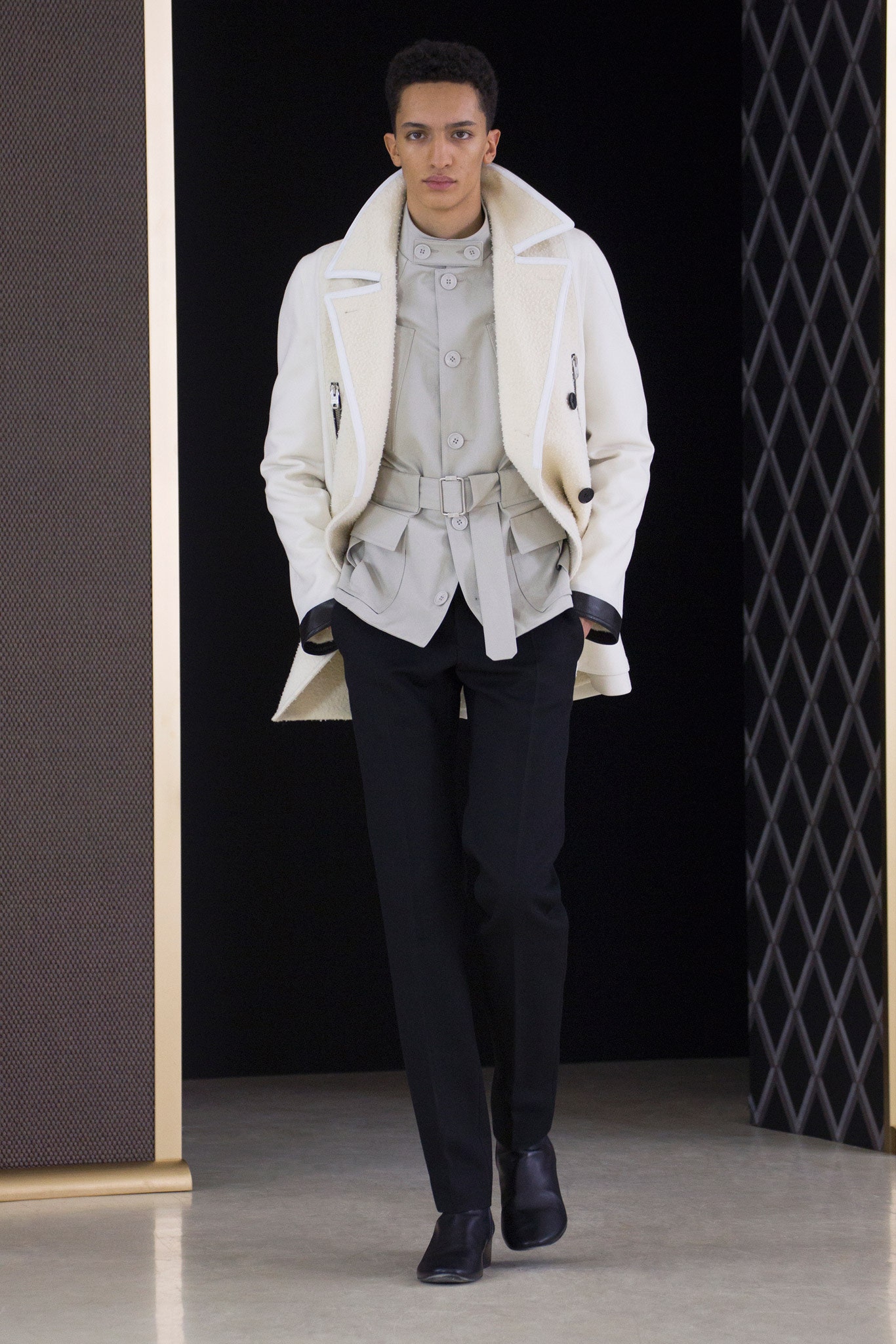 white wool coat gray jacket black pants
