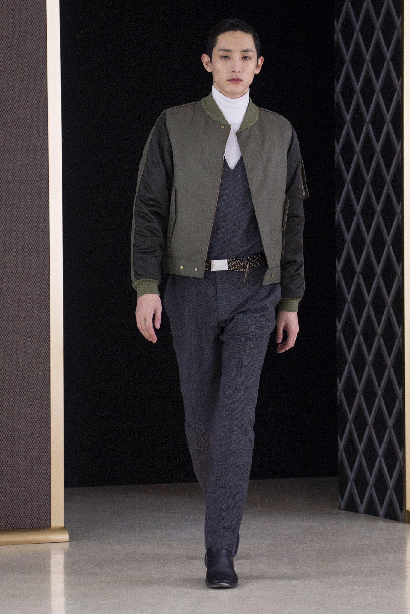 green fitted jacket with white turtleneck