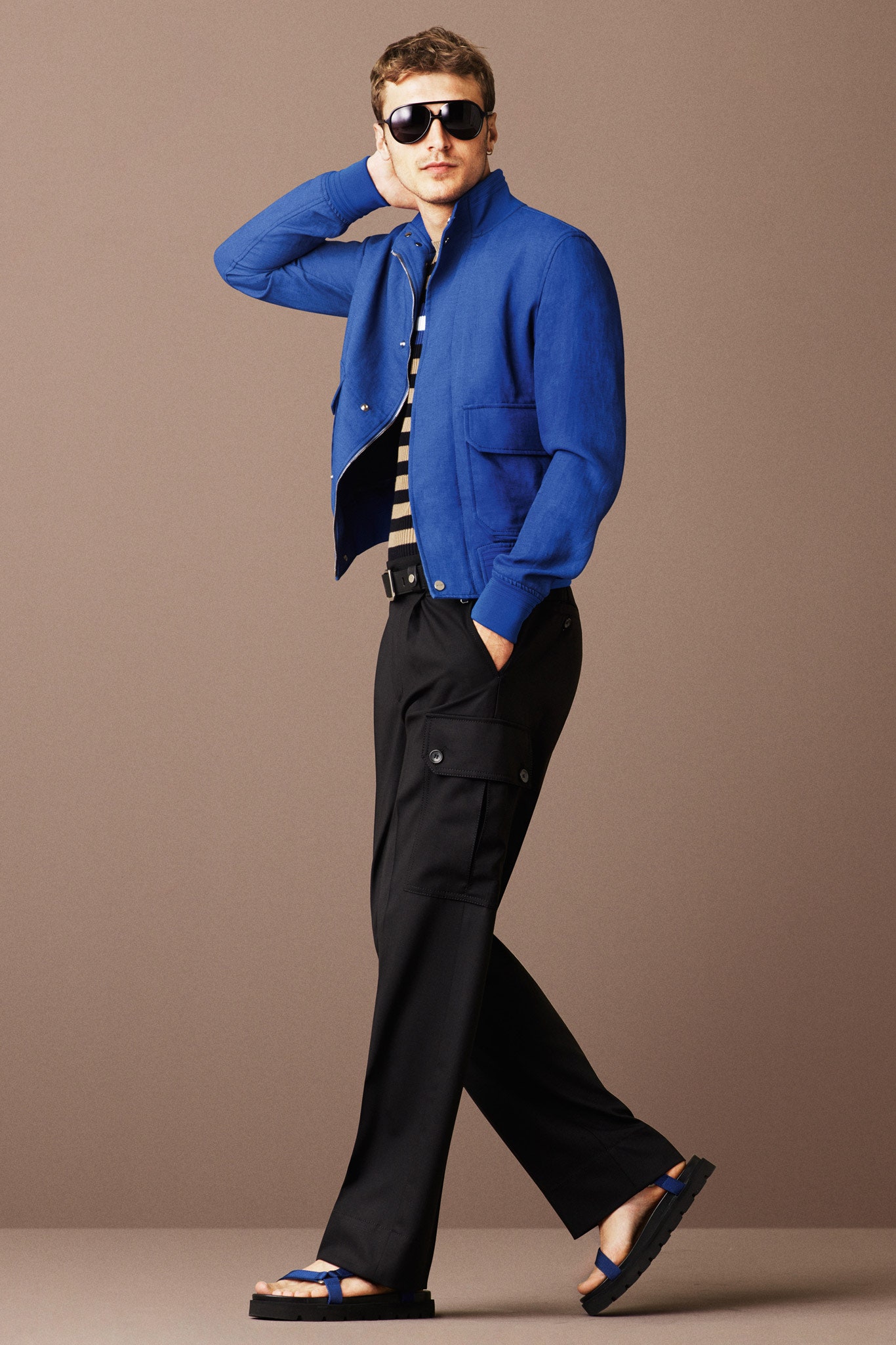 blue fitted jacket with cargo pants